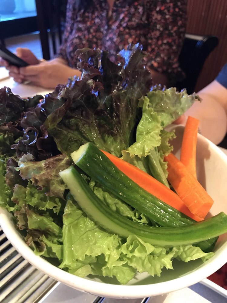 Grilled pork cheek and beef tongue with charred edges